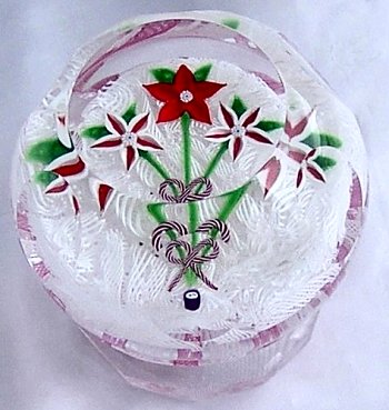 Piedouche paperweight with flowers, by Deacons