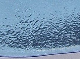 Frosting on blue plate