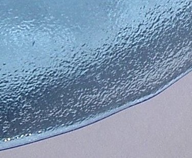 Frosting on blue plate